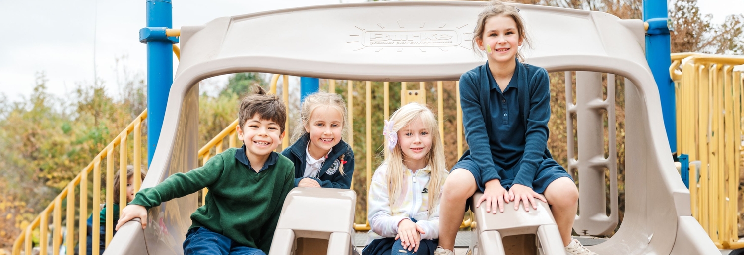 Kids Smiling on Playground