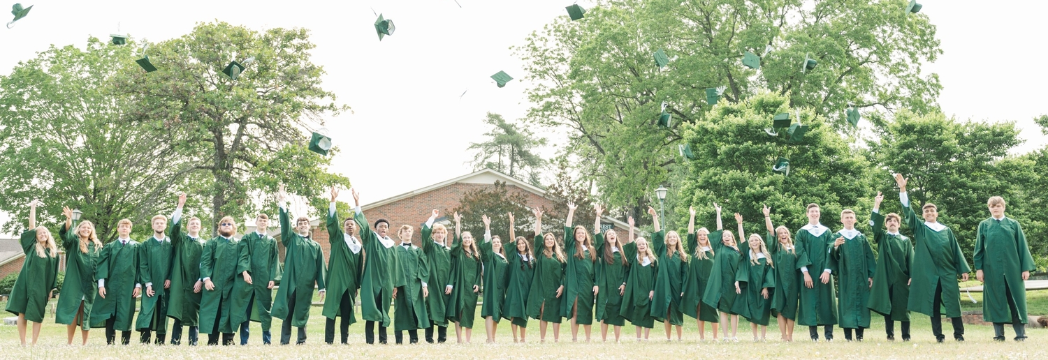 Graduates Tossing Caps